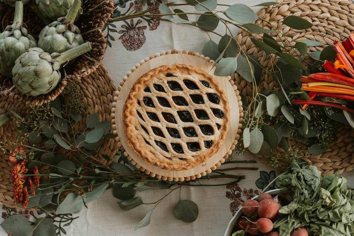A cluttered snack drawer filled with chips and candy